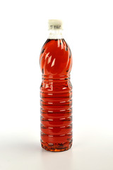 Fish sauce in plastic bottle isolated on white background