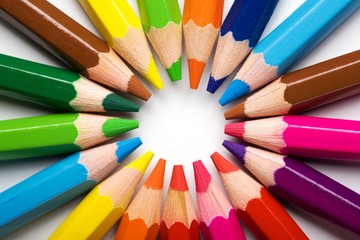 Fototapeta premium Assortment of coloured pencils with shadow on white background