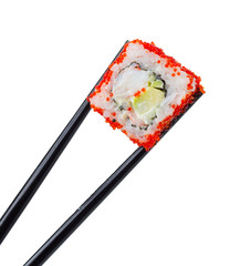 Sushi roll in chopsticks isolated on white background