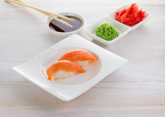 Japan cuisine. Sushi on a gete over wooden background