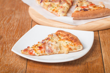 Fresh baked pizza slice