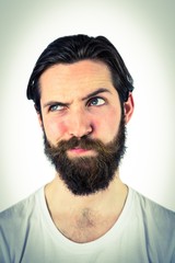 Obraz premium Handsome hipster thinking and looking away
