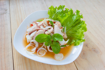 Thai style salad seafood on the wood table