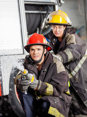 Fototapeta premium Firefighters Practicing At Fire Station