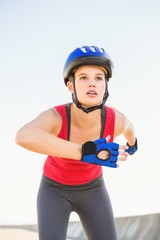 Focused sporty blonde skating