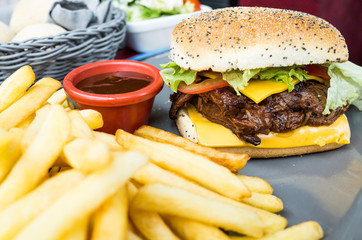 Cheese burger - American cheese burger with Golden French fries