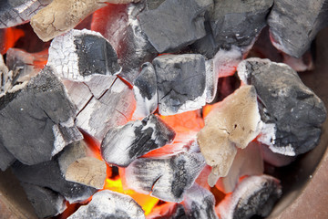 Stock Photo:.burning charcoal in old stove