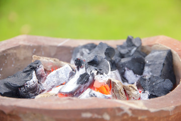 Stock Photo:.burning charcoal in old stove