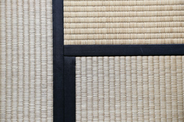 Japanese Tatami Rug Background with three Tatamis Joining - obrazy, fototapety, plakaty