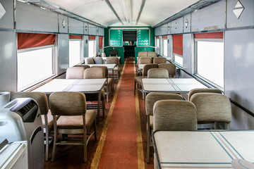 Fototapeta na wymiar Dining Car in an Old Train Car