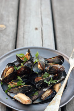 Steamed fresh mussels with wine and parsley.