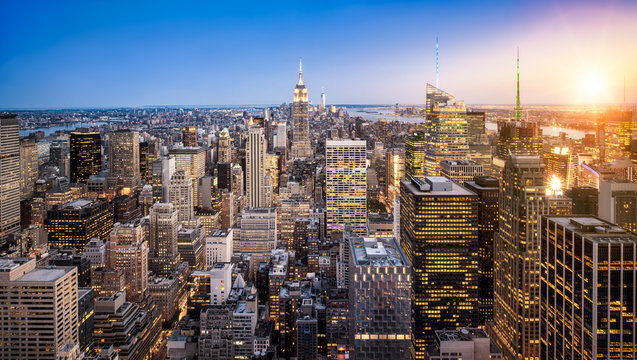 Fototapeta Manhattan Skyline mit Empire State Building bei Sonnenuntergang in New York City USA
