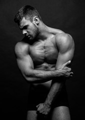 Muscled male model in studio