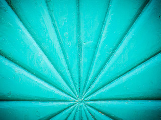 closeup of an old turquoise wooden door