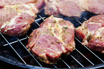 Meat cooked over charcoal