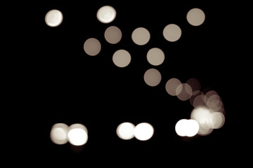 abstract dark bokeh lights background ,  defocused background, g