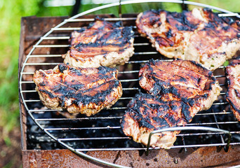 Meat cooked over charcoal