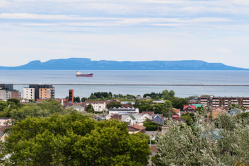 View of downtown Thunber Bay Ontario, Canada north ward and harbor from Hillcrest Park, with Sleeping Giant in background