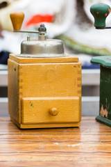 vintage coffee grinder in a flea market