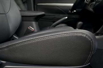 Leather seat in modern car. Interior detail.