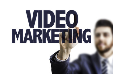 Business man pointing the text: Video Marketing