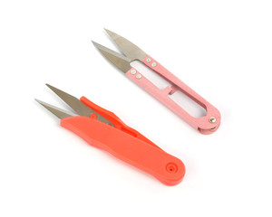 Scissors for thread cutting isolated on white background
