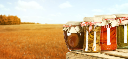 jars and autumn landscape 