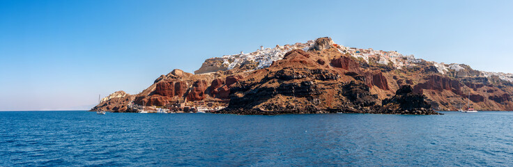 Panorama of Oia town from the sea on Santorini