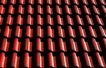 Red corrugated tile element of roof. Seamless pattern
