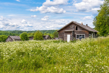 Plakat Old wooden house in Russian village