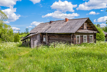 Fototapeta na wymiar Old wooden house in Russian village