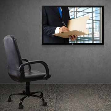 Office chair and TV screen