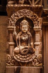 Fototapeta premium Wooden nepalese statue
