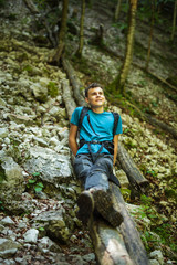 Happy teen boy hiker