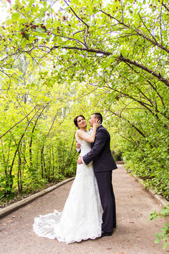 Bride and Groom at wedding Day walking Outdoors on autumn nature