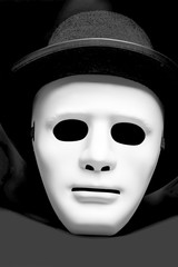 White mask in cylinder hat