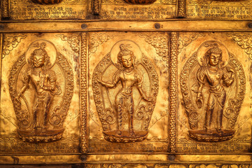 Golden reliefs closeup