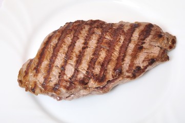 Grilled beef steak on plate