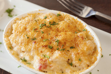 lobster mac and cheese topped with truffle oil