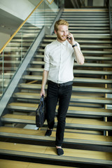 Young businessman on the stairs