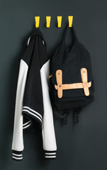Backpack and jacket on the wall