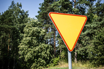 Give Way triangle sign.
