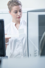 Woman in white coat