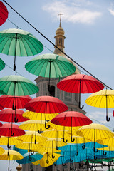 Fototapeta na wymiar Many of colorful hanging umbrellas