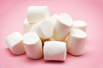 heap of marshmallow on pink