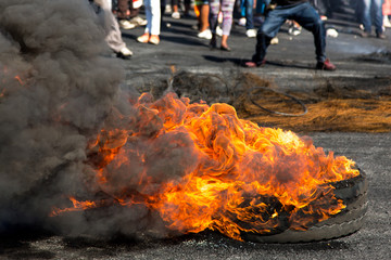 Protest Action with Burning Tyres - obrazy, fototapety, plakaty