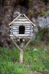 Bird cage made of branches.