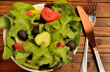 Bowl with vegetable salad