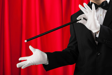 Close-up Of Magician Showing Trick