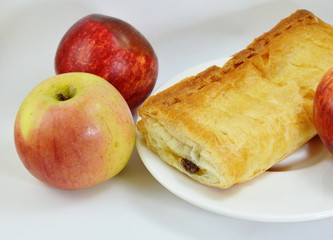 apple pie and fresh apple on dish